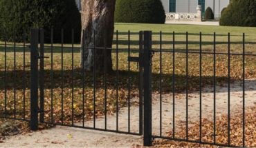 2D iron fence wire panel metal garden fence used in a front yard.