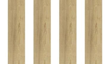 SPC plastic floor tiles in vinyl plank wood design.
