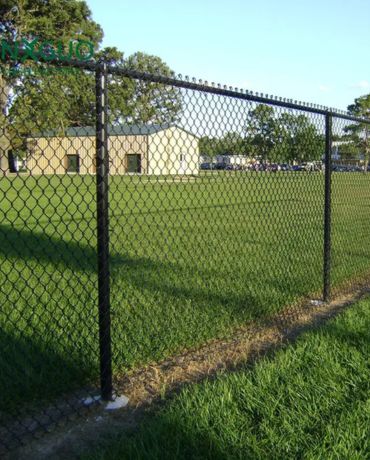 Galvanized iron mesh fence in black color.