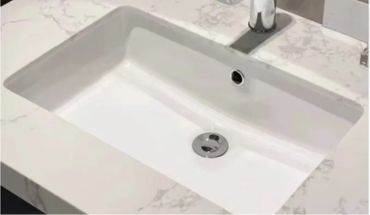 Glazed undermount wash basin.