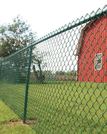 PVC coated galvanized wire chain link fence in farmhouse.