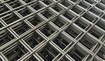 Reinforcing steel welded mesh panel stacks.