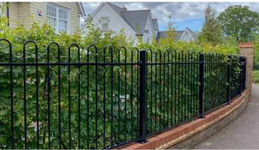 Tubular galvanized steel black color garden fence.