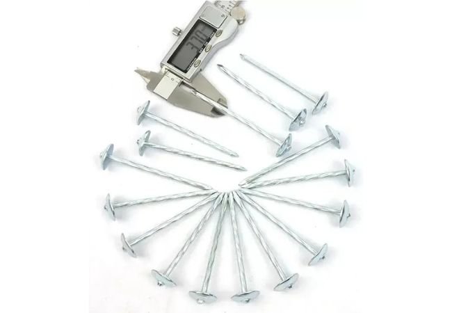 Umbrella roof nail with caliper.