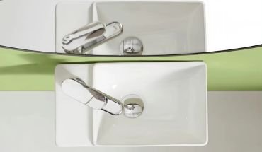 Wall mounted ceramic wash basin.
