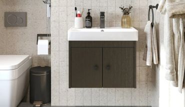 Wall mounted wash basin with cabinet.