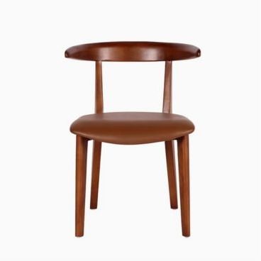 Classic wooden dining chairs in ash accent.