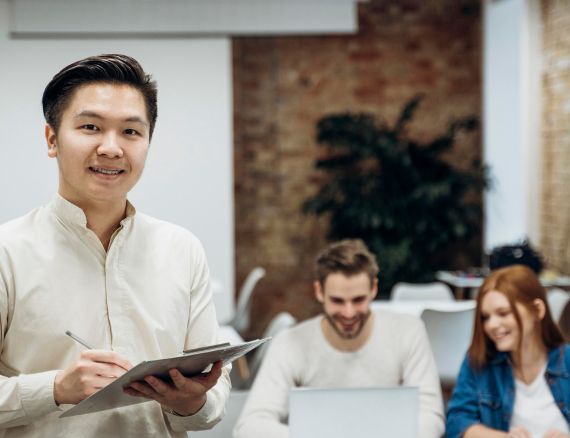 Manufacturing expert with customers meeting.
