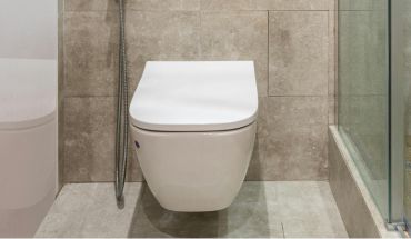 Modern style toilet in aesthetically bathroom area.