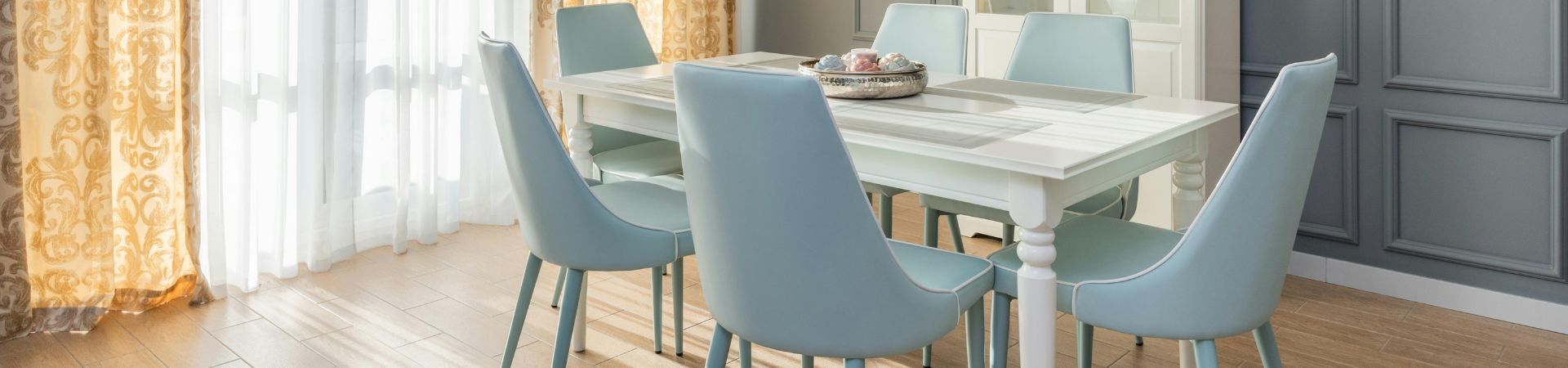 Blue pastel modern dining chairs.
