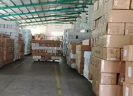 Natural stone in pallets in factory.