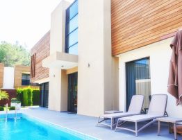 Pool area with WPC board building design.