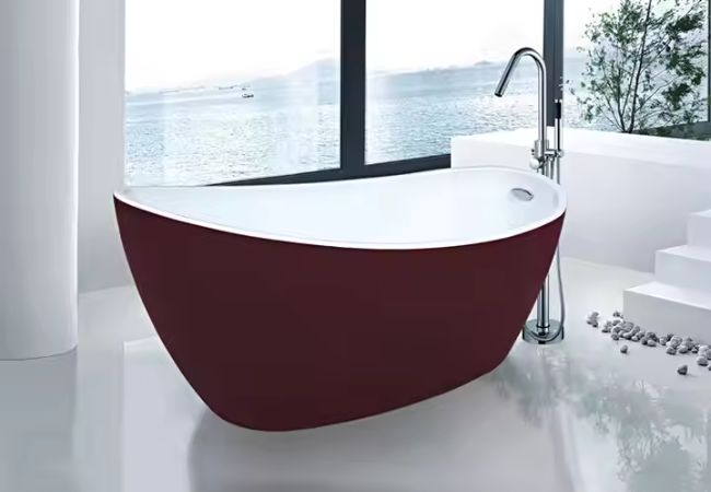 Red stand shower bathtub in oval edgy shape.