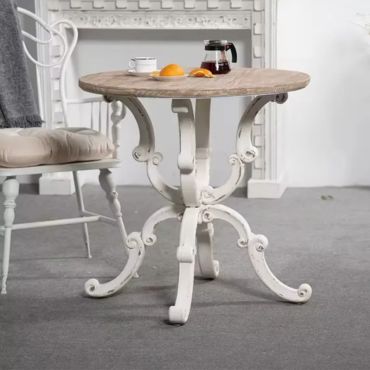 Round rustic farmhouse coffee table.