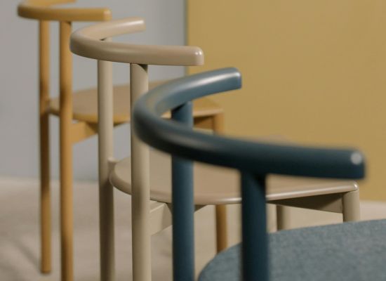 Selection of chairs in wood accent.