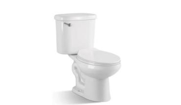 Commode two-piece toilet with flush handle.