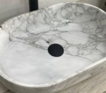 Wash basin in oval shape.