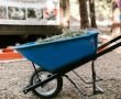Wheelbarrow application in garden from building materials supplier in China.