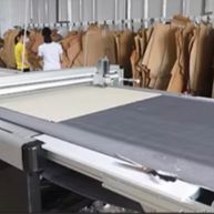 Sofa manufacturer with textile cutting machine.